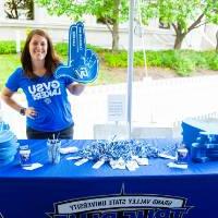 Woman with foam finger at Comerica Park event